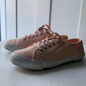 Peach tennis shoes with rose gold eyelets